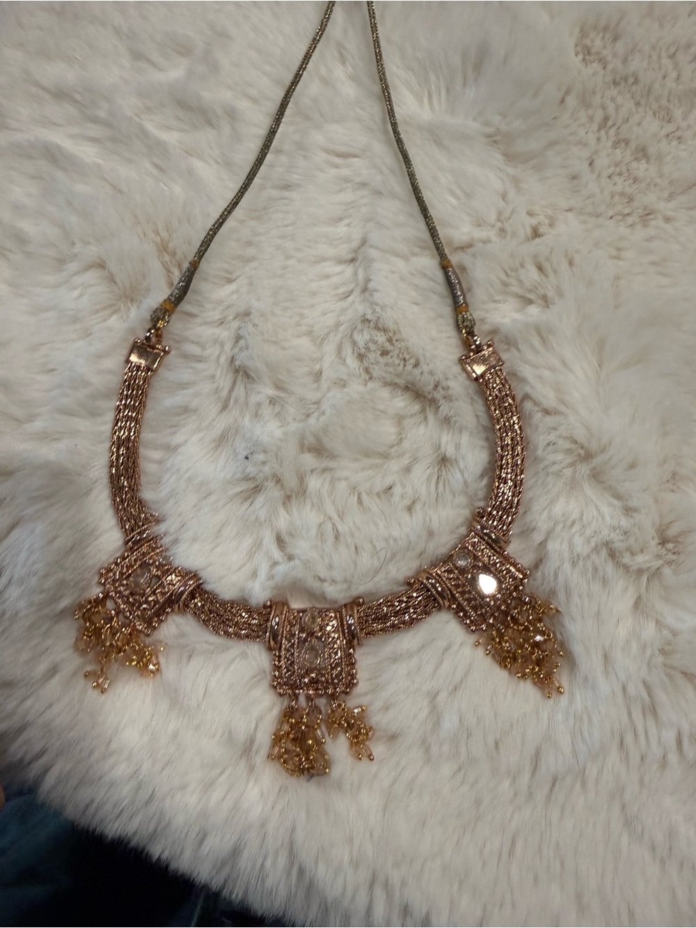 Gold-Tone Statement Necklace with Ornate Pendant Details